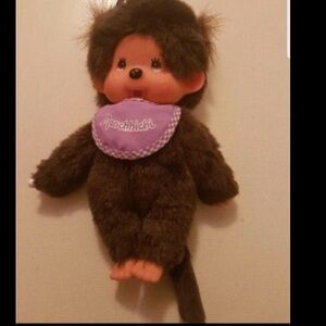 1970s Monchhichi Plush Doll with pink bib